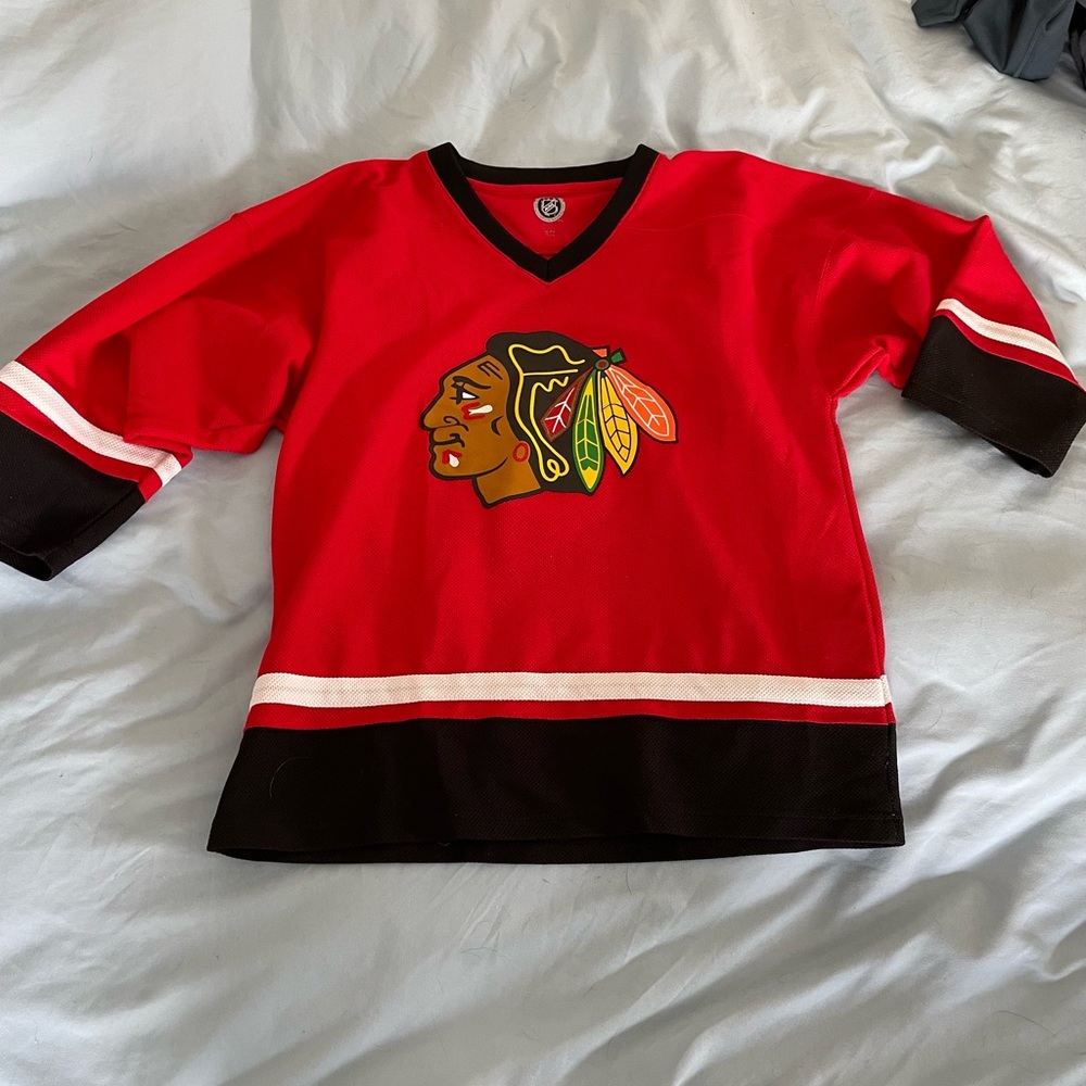 Large kids/small adult Blackhawks “jersey”
